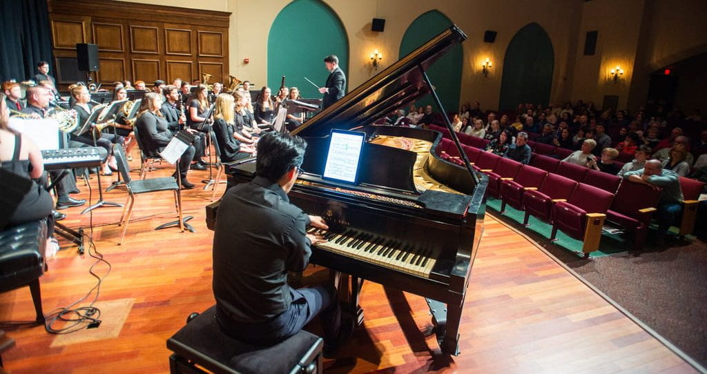 Sang Woo pianist and Eric Melley conducting Symphonic Winds Concert